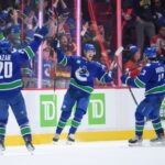 Canucks fight back from four-goal deficit to defeat Canadiens in OT