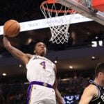 Lakers beat Bucks in thriller, James overtakes Johnson