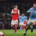 Ruthless Man City beat Arsenal to go top