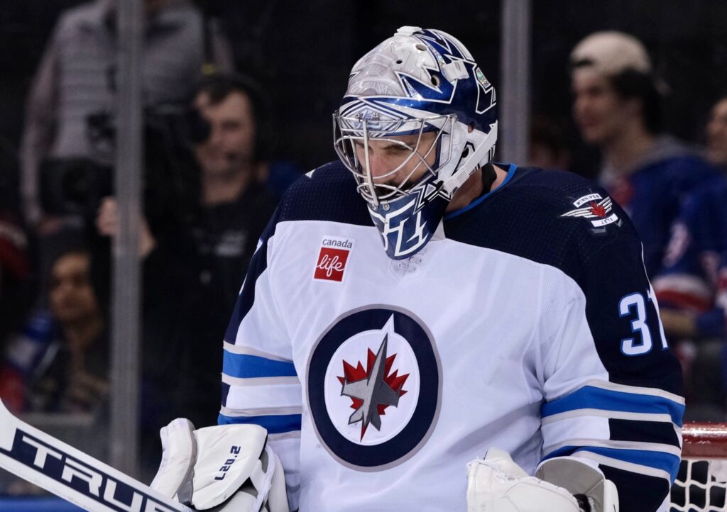 Hellebuyck makes season-high 50 saves to guide Jets past Rangers 1