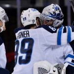 Hellebuyck makes season-high 50 saves to guide Jets past Rangers