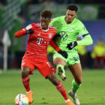 10-man Bayern defeat Wolfsburg to regain top spot