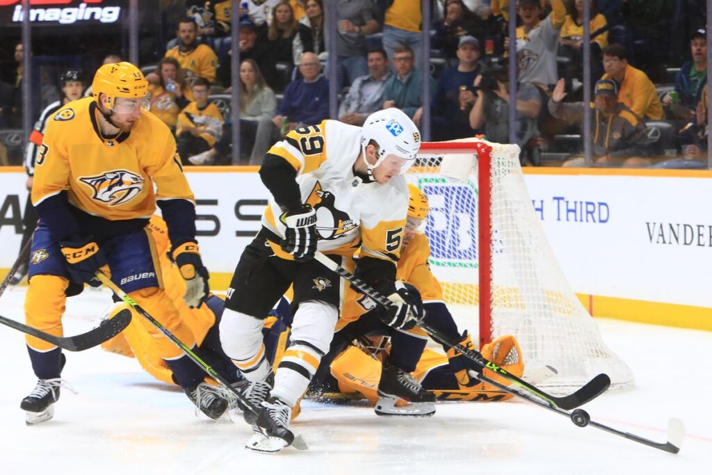 Zucker’s late strike leads Penguins to 3-1 win over Predators