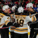 Bruins beat Hurricanes 4-3 after penalties