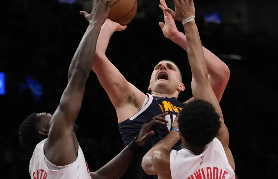 Jokic leads Nuggets to 108-102 win over Nets