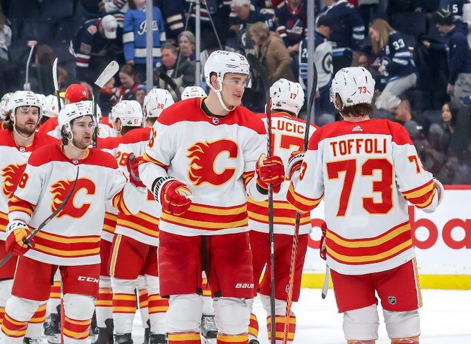Flames beat Jets 3-1 to preserve playoff chance