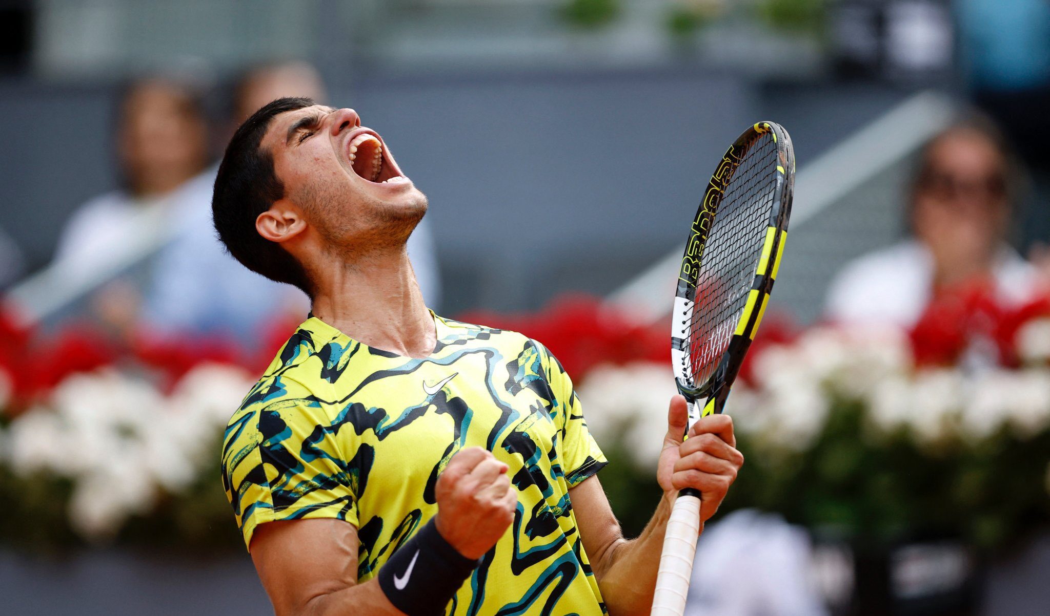 Alcaraz survives early scare to win Madrid opener