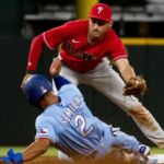 Semien and Perez help Rangers win 2-1 over NL-champions Phillies