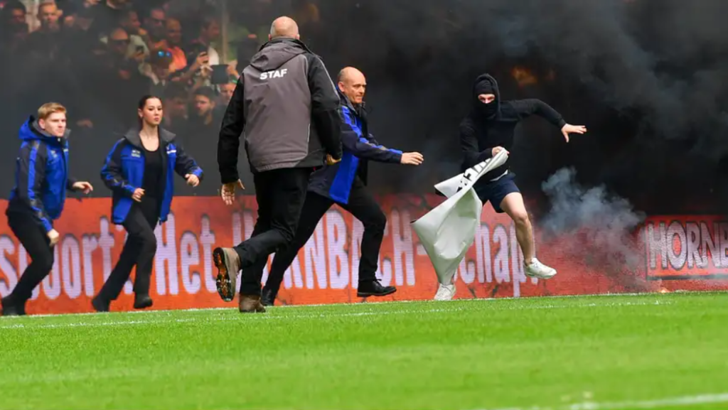 Pitch invader and thrown objects stopped Ajax match in Netherlands