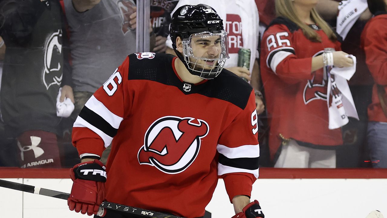 Devils humiliate Hurricanes 8-4 to keep season alive in Game 3