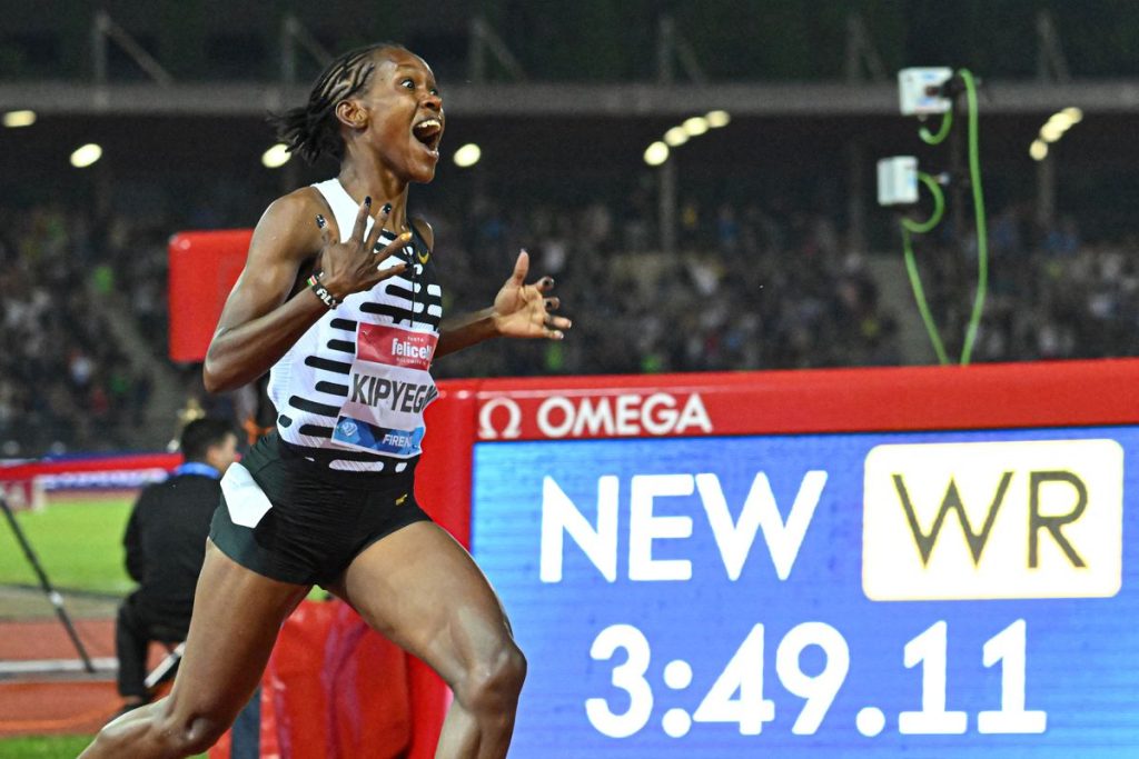 Kenya’s Faith Kipyegon set a new women’s 1,500 meters world record
