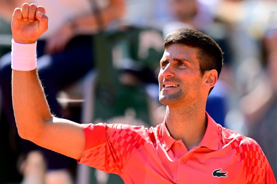 Djokovic goes through after difficult win over Khachanov