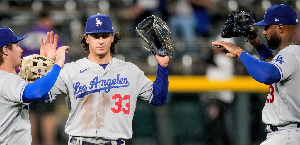 Dodgers sink Rockies 14-3 after weather delay