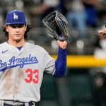 Dodgers sink Rockies 14-3 after weather delay