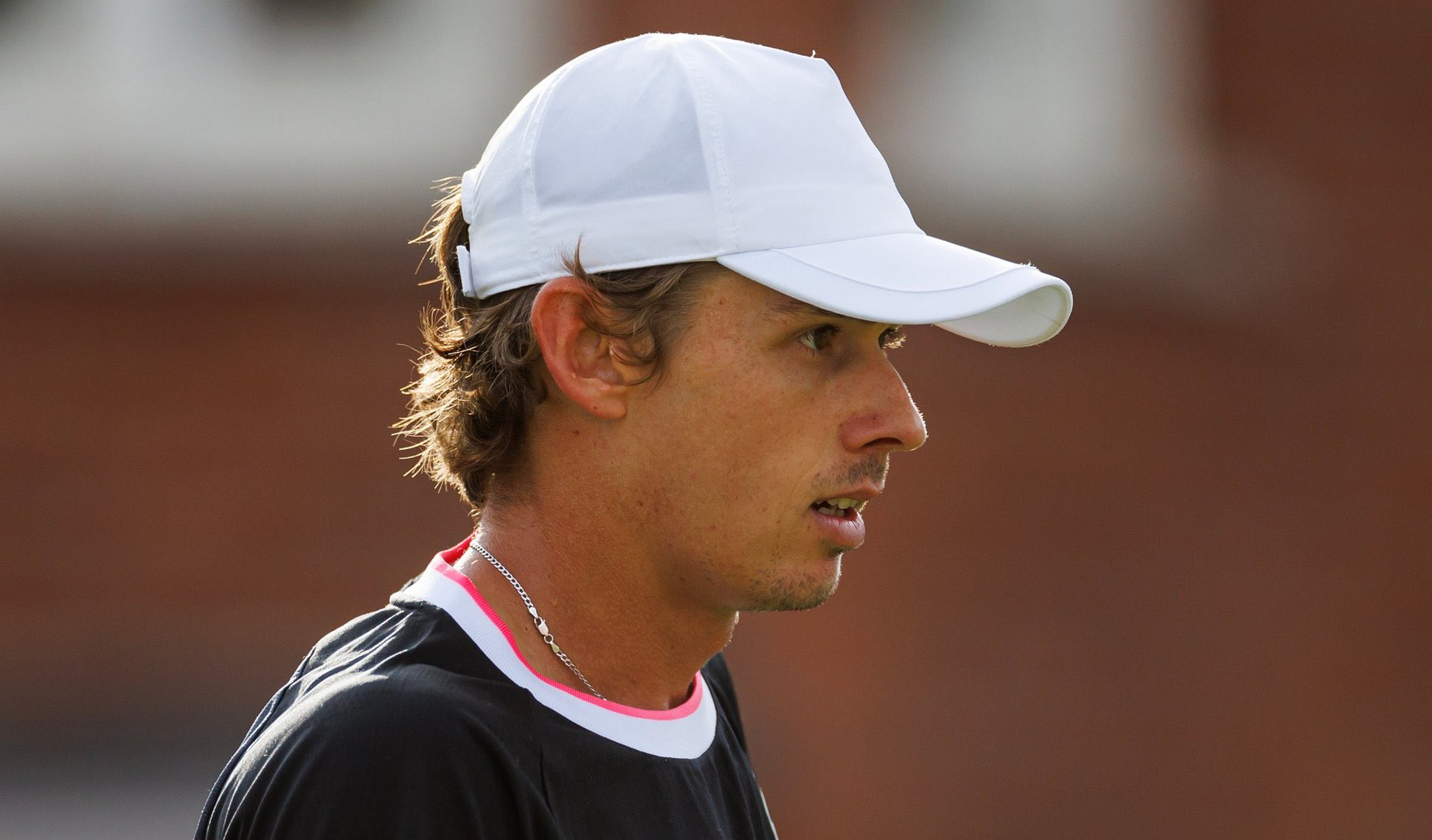 De Minaur overcomes Rune to reach first final at Queen