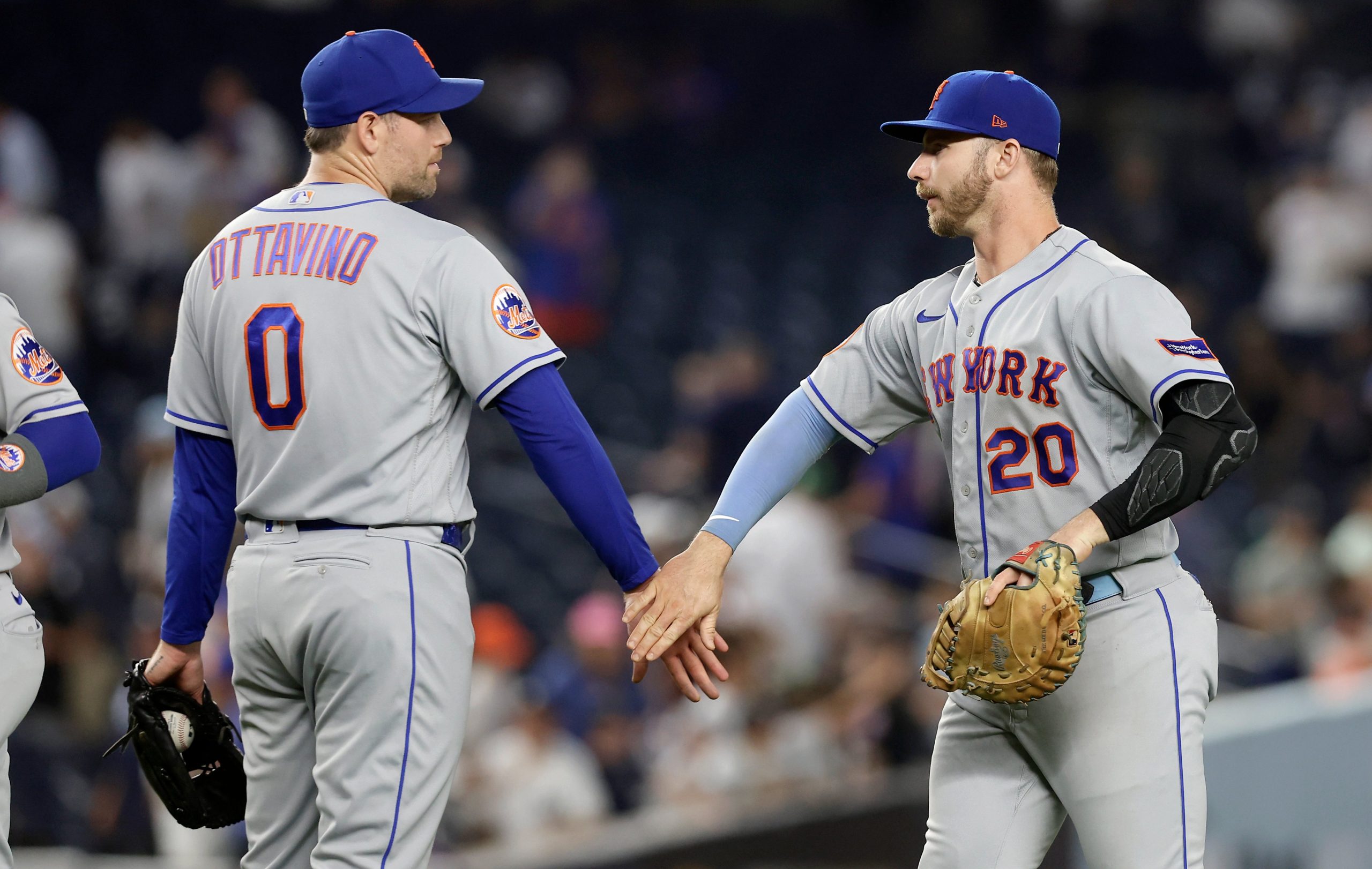Mets overpower Nationals 2-1 after rain delay