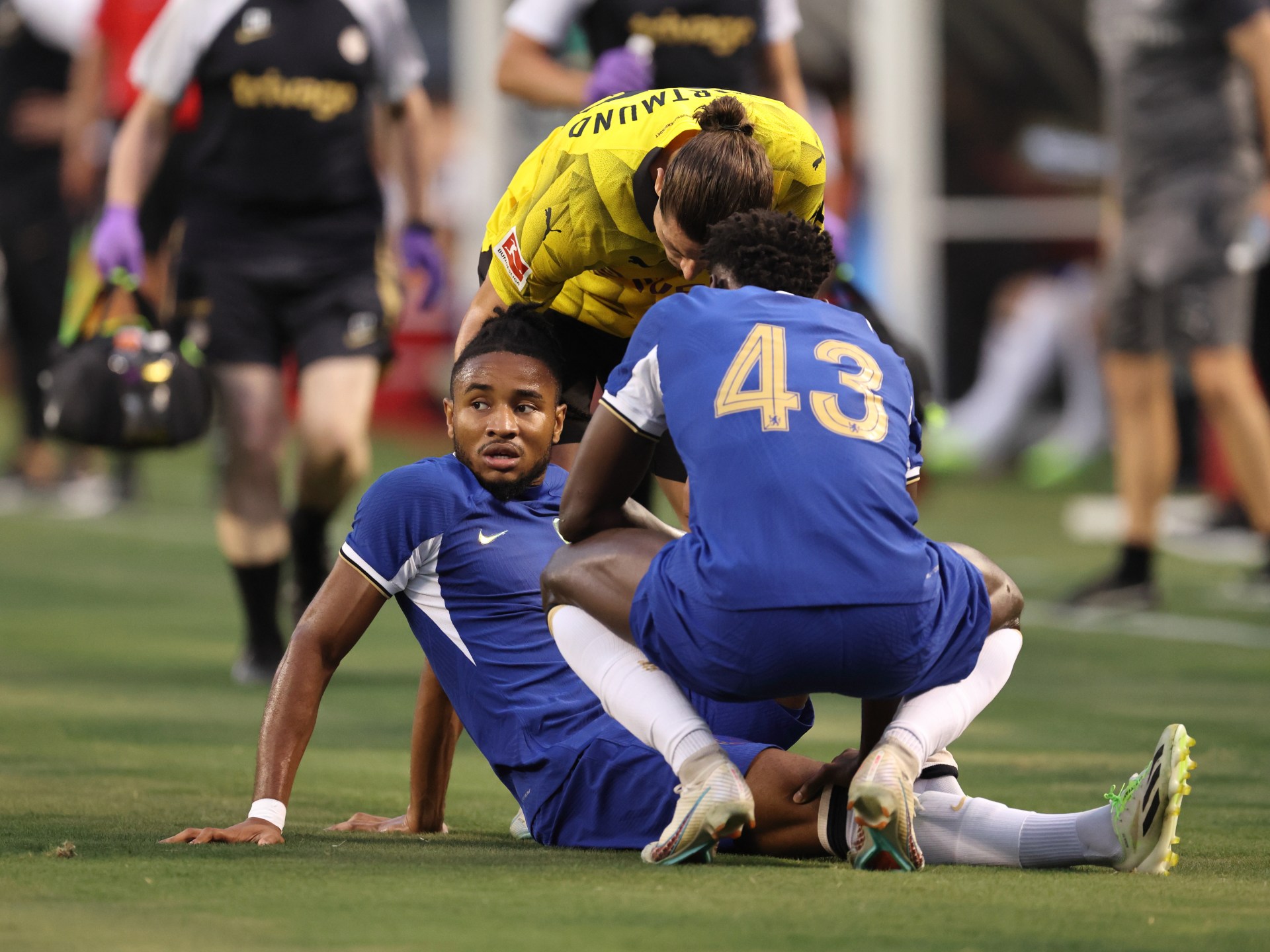 New Chelsea striker Nkunku injures knee in friendly