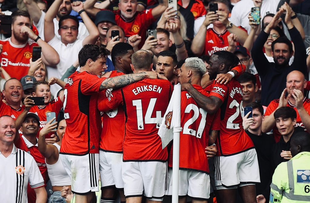 Man United survive early scare to beat 10-man Forest in frantic game