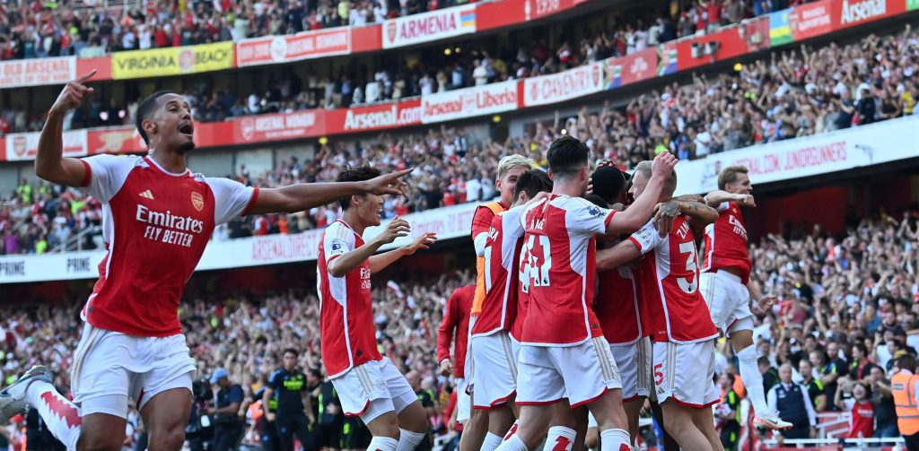 Two late goals help Arsenal overhaul Man United
