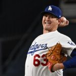 Dodgers sink down Padres 11-2 as Freeman homers and has 4 hits