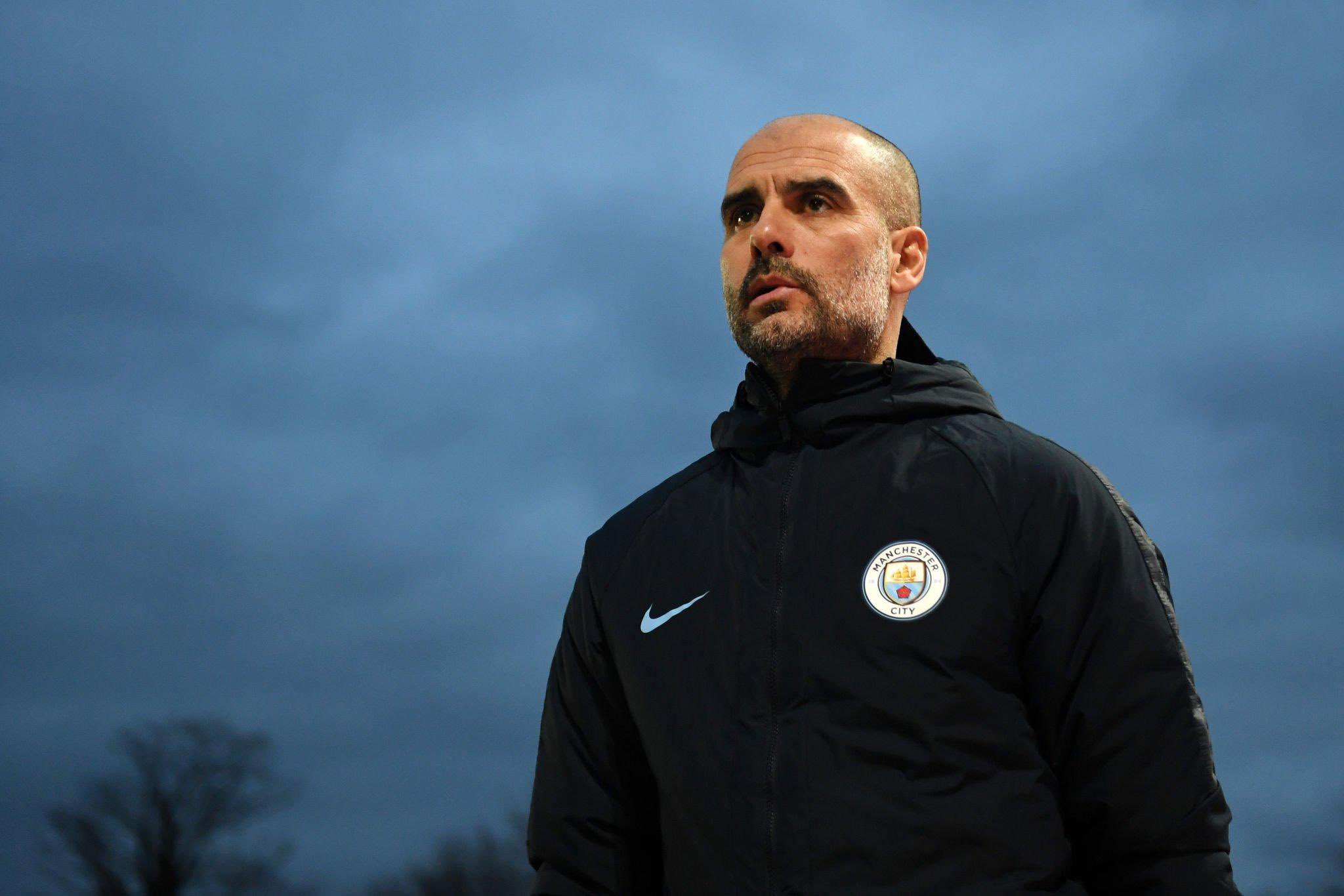 Guardiola back on line for Man City after back operation