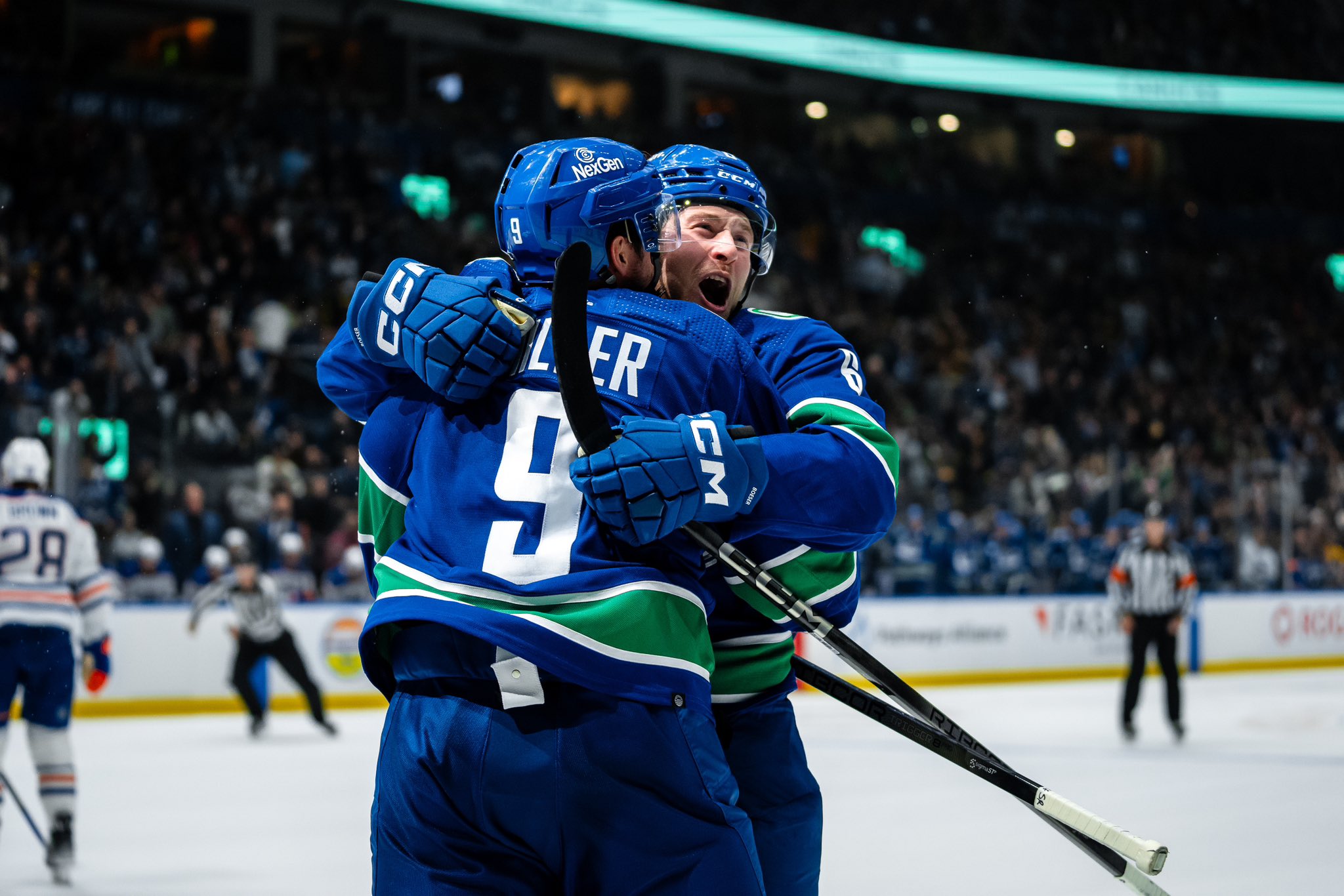 Canucks sink Oilers 8-1 in opener as Brock Boeser scores 4 goals