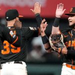 Giants overpower Dodgers 2-1 to stop their winning streak