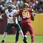 Hurts despite injury helps Eagles to defeat Commanders 38-31