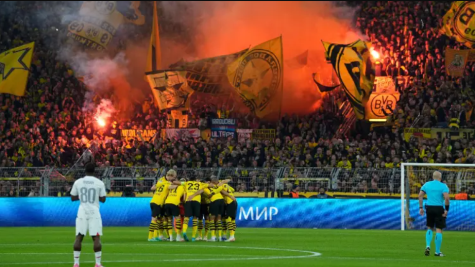 Dortmund fans take hit at UEFA with a banner in Champions League