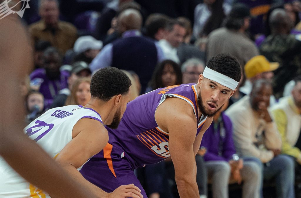 Suns edge out Warriors 108-104 in season opener