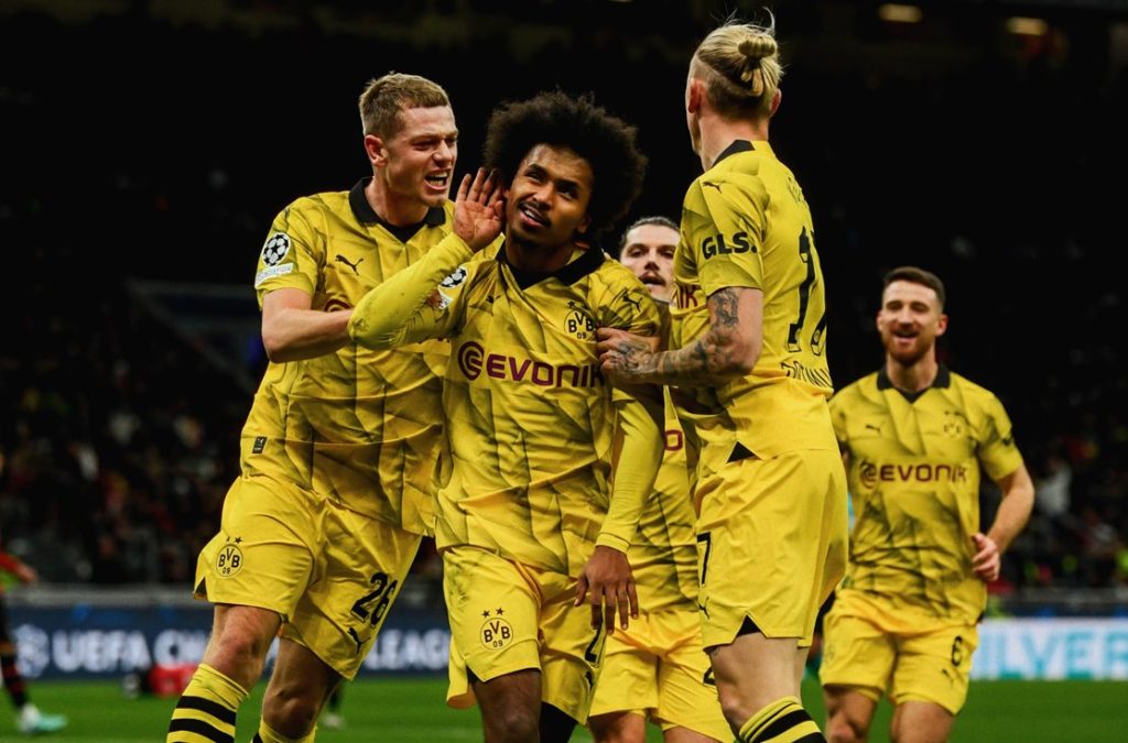Dortmund secures Champions League 1/8-final, beating Milan 3-1 12