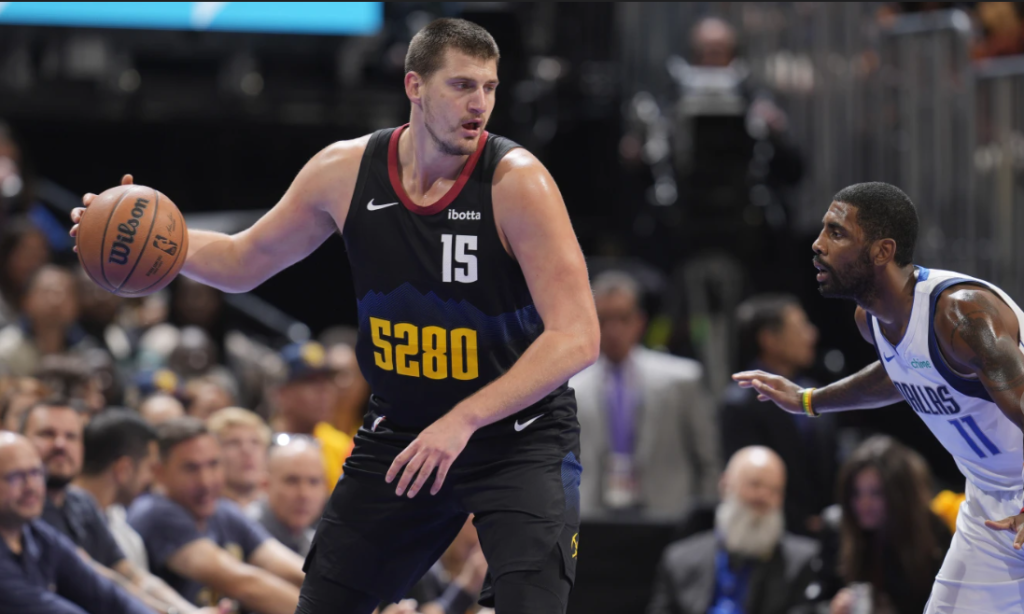 Jokic nets 33 points to push Nuggets 125-114 over Mavericks