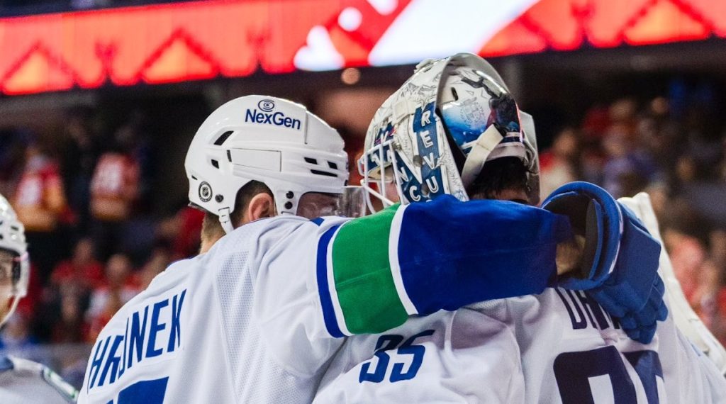 Canucks earn 4-3 victory over Flames 4