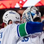 Canucks earn 4-3 victory over Flames