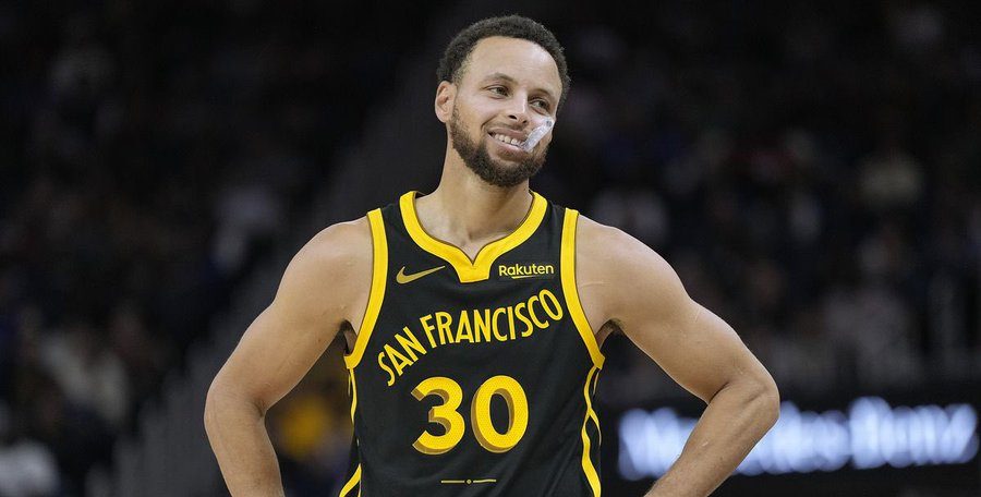 Curry notches 33 points to help Warriors beat Celtics in OT