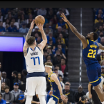 Doncic returns in style with 39 points and 132-122 win over Warriors