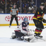 Canucks come back in style to beat Blue Jackets 5-4 in OT