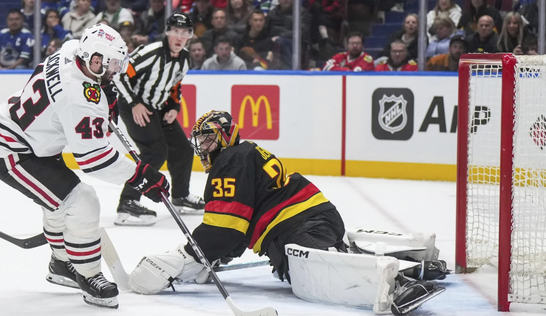 Canucks beat Blackhawks 2-0, Bruins win over Jets in 1st-place clash