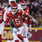 Mahomes leads Chiefs to 26-7 playoff win vs Miami in record low temps