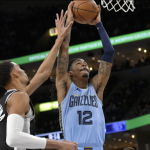 Morant dunks over Wembanyama as Grizzlies top Spurs 106-98