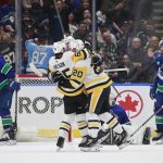 Karlsson notches in OT for Penguins 4-3 win vs. Canucks