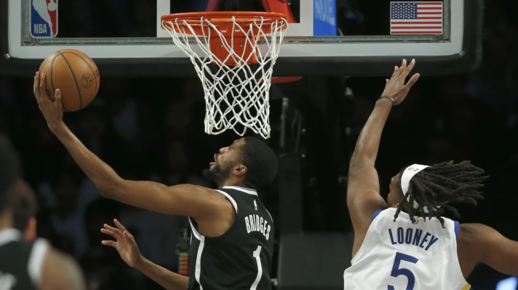 Warriors overcome slow start to beat Nets 109-98