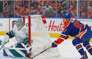 Oilers level series vs. Canucks with last-minute goal from Bouchard