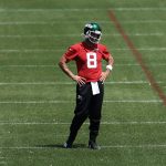 Jets quarterback Rodgers not at minicamp