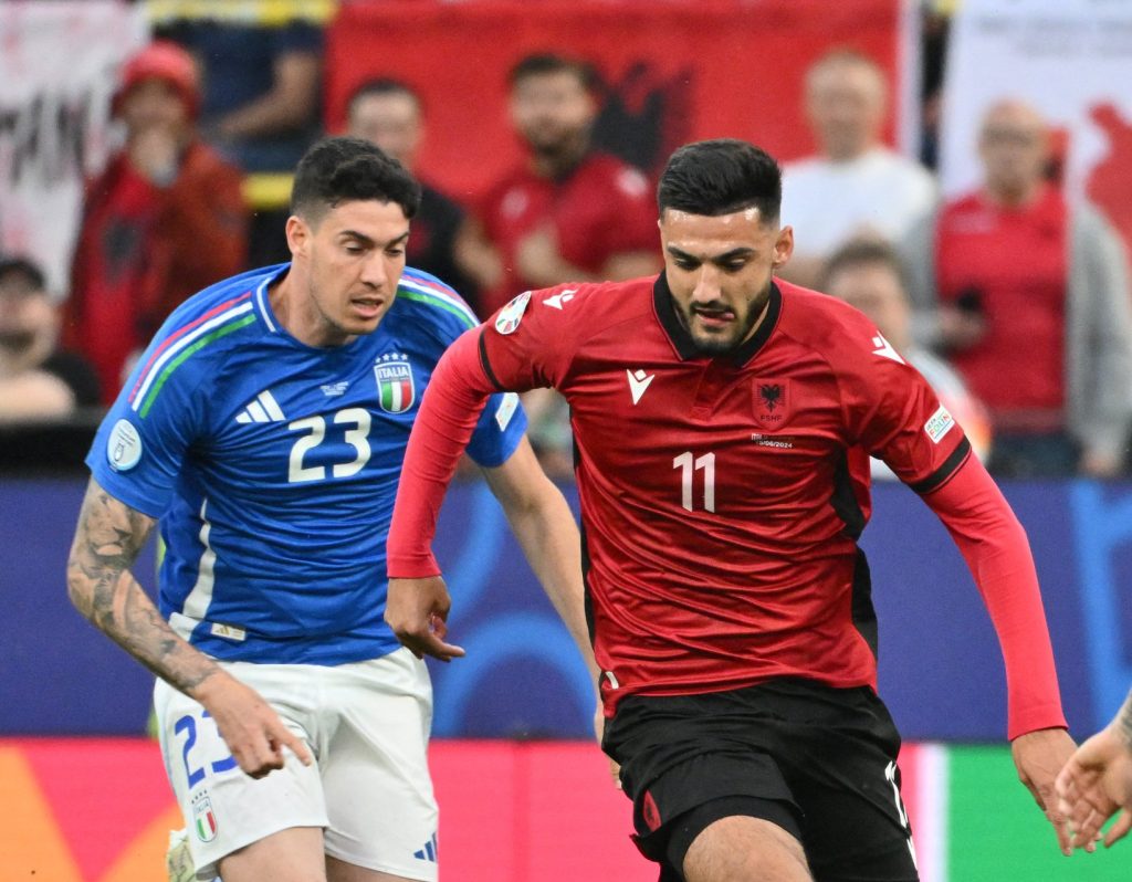 Italy beat Albania 2-1 at Signal Iduna Park despite early shock