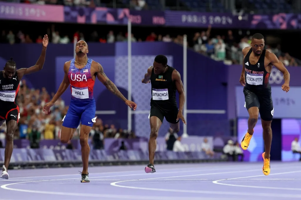 Quincy Hall comes from fourth to win 400m Olympic gold