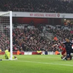 Arsenal falls six points behind Liverpool squandering  two-goal lead