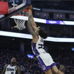 Kings shine under new coach, trash Warriors 129-99