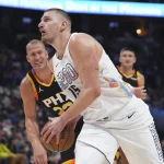 Jokić triple-double makes NBA history in Nuggets’ OT win over Suns